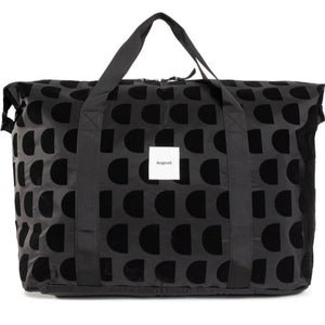 Black sports bag, long shoulder strap as well as handles. Half circle dark black colouring.
